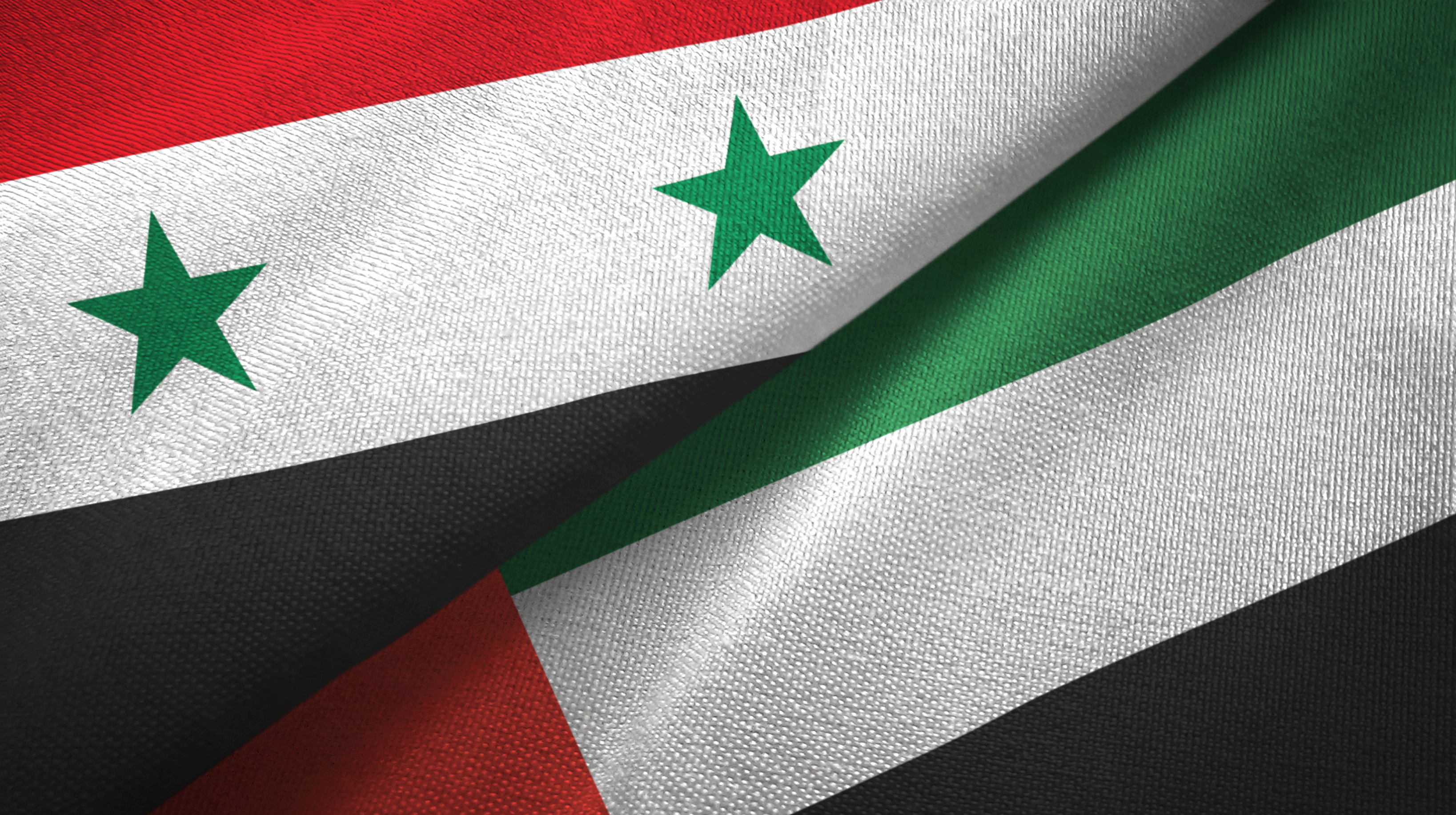 Drapeaux syrien et émirati © Oleksii - Adobe stock